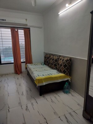 Bedroom in Studio Apartment at Royal Palms Garden View, Goregaon East – for Rent