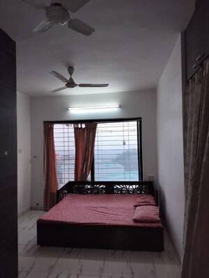 Bedroom in Studio Apartment at Royal Palms Garden View, Goregaon East – for Rent