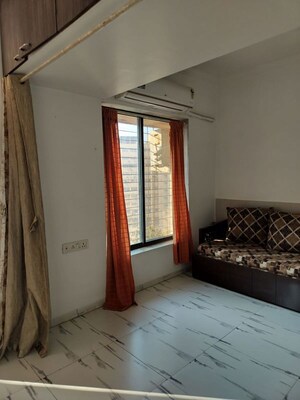 Bedroom in Studio Apartment at Royal Palms Garden View, Goregaon East – for Rent