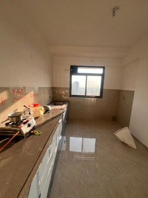 Kitchen in 2 BHK Apartment at Shekhar NB Towers, Moshi – for Rent