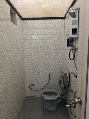 Bathroom in 2 BHK Apartment at Shivajinagar – for Rent