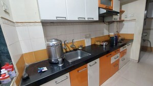 Kitchen in 2 BHK Apartment at Lodha Paradise, Majiwada – for Rent