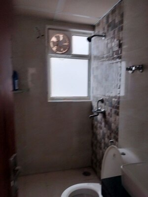 Bathroom in 2.5 BHK Apartment at Mahagun Moderne, Sector 78 – for Rent