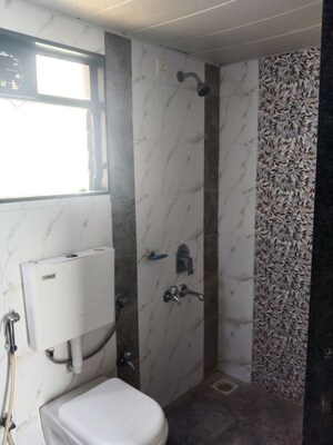 Bathroom in 1 BHK Apartment at Triveni Dynamic Ultima Bliss, Kalyan West – for Sale