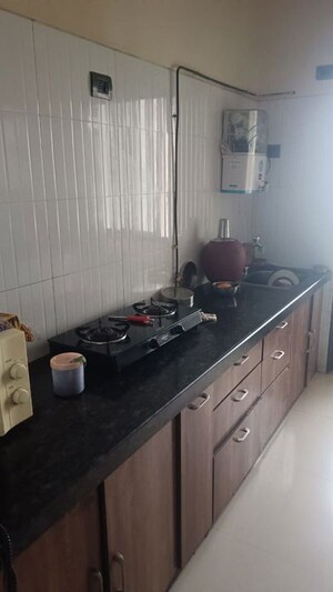 Kitchen in 2 BHK Apartment at Satellite Tower, Goregaon East – for Rent