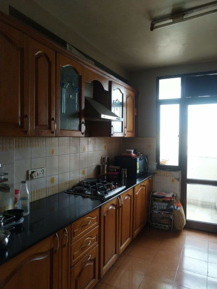 Kitchen, emaar-emerald-floors 3 Bedroom 1395 Sq.Ft. Builder Floor In Sector 65 Gurgaon 10508166