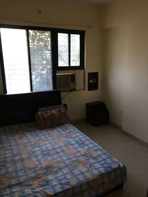 Bedroom in 2 BHK Apartment at Divya Smruthi, Malad West – for Rent