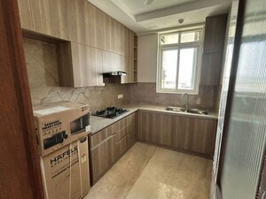 Kitchen in 3 BHK Builder Floor at Ambience Creacions, Sector 22 – for Rent