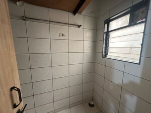 Bathroom in 1 BHK Apartment at Tyagi Uttam Plaza, Kharadi – for Rent