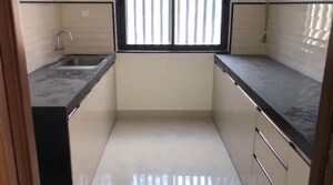 Kitchen in 2 BHK Apartment at Dynamix Divum, Malad East – for Sale