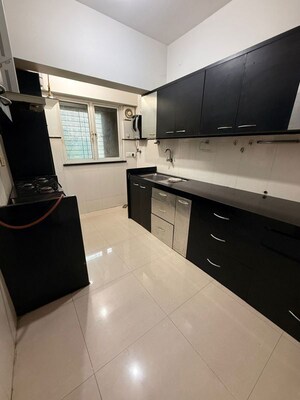 Kitchen in 3 BHK Apartment at Garden Enclave, Pokhran Road No One – for Rent