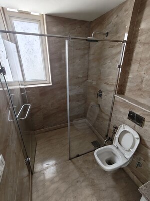 Bathroom in 3.5 BHK Apartment at Ambience Tivertone, Sector 50 – for Rent