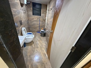 Bathroom in 2 BHK Apartment at Courtyard by Narang Realty and The Wadhwa Group, Pokhran Road No Two – for Rent