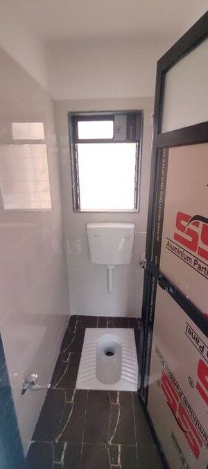 Bathroom in 1 BHK Apartment at Panvelkar Daffodils, Ambernath – for Sale