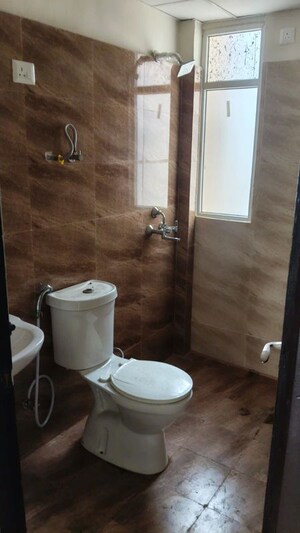 Bathroom in 3 BHK Apartment at Aditya Celebrity Homes, Sector 76 – for Rent