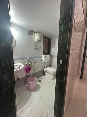 Bathroom in 1 BHK Apartment at Indravati Apartment, Dahisar East – for Rent
