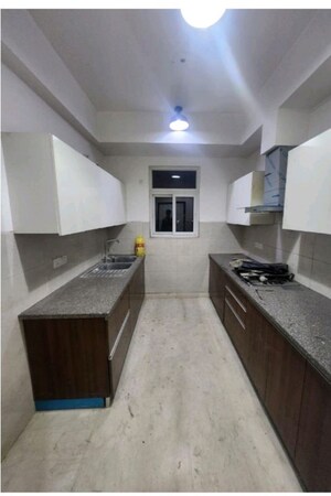 Kitchen in 3 BHK Apartment at Puri Anand Villas Phase II, Sector 81 – for Rent
