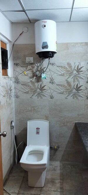 Bathroom in 1 RK Apartment at Paramount Golf Forest Studio Apartments - OAK Towe, Zeta I Greater Noida – for Rent