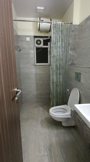 Bathroom in 2 BHK Apartment at Omkar Ananta, Goregaon East – for Rent
