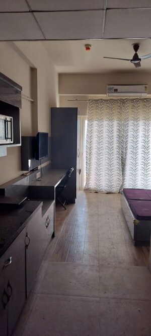 Team Area in 1 RK Apartment at Paramount Golf Forest Studio Apartments - OAK Towe, Zeta I Greater Noida – for Rent