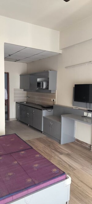Kitchen in 1 RK Apartment at Paramount Golf Forest Studio Apartments - OAK Towe, Zeta I Greater Noida – for Rent