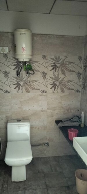 Bathroom in 1 RK Apartment at Paramount Golf Forest Studio Apartments - OAK Towe, Zeta I Greater Noida – for Rent