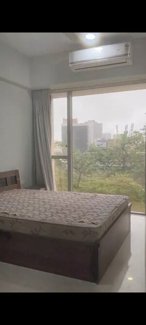 Bedroom in 2 BHK Apartment at Transcon Triumph Tower, Andheri West – for Sale