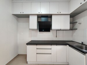 Kitchen in 2 BHK Apartment at Bhartiya Nikoo Homes Phase 2, Thanisandra Main Road – for Rent