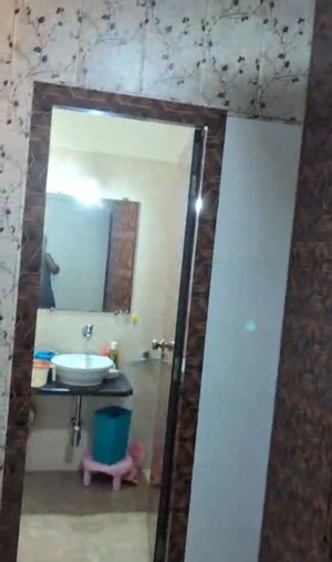 Bathroom in 2 BHK Apartment at Sudarshan Sky Garden, Ghodbunder Road – for Rent