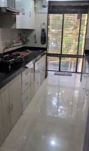Kitchen in 2 BHK Apartment at Sudarshan Sky Garden, Ghodbunder Road – for Rent