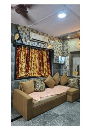 Living Room in 2 BHK Apartment at Nav Munjal Nagar CHS, Govandi – for Rent