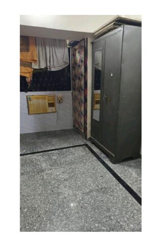 Bedroom in 2 BHK Apartment at Nav Munjal Nagar CHS, Govandi – for Rent