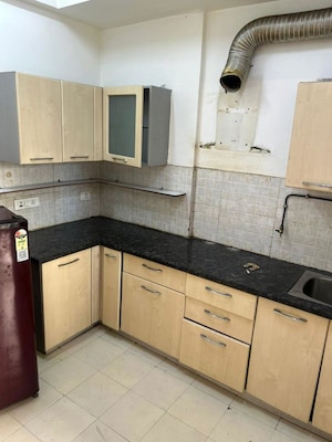 Kitchen in 3 BHK Apartment at Amrapali Sapphire, Sector 45 – for Rent