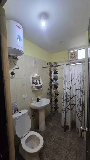 Bathroom in 3.5 BHK Apartment at Prateek Wisteria, Sector 77 – for Rent