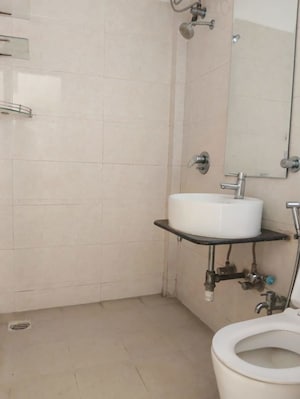 Bathroom in 1 BHK Apartment at Veera Desai Road – for Sale