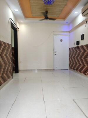 Living Room in 1 BHK Apartment at Aashirwad CHS Nerul, Nerul – for Rent