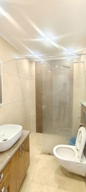 Bathroom in 3 BHK Builder Floor at Dharam Colony – for Rent