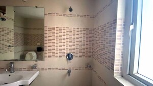 Bathroom in 4 BHK Apartment at ATS Golf Meadows Prelude, Central Derabassi – for Rent