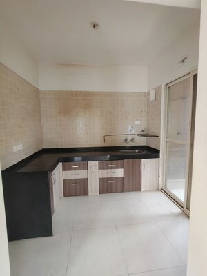 Kitchen in 2 BHK Apartment at Nyati Eternity 2 CHS, Undri – for Sale