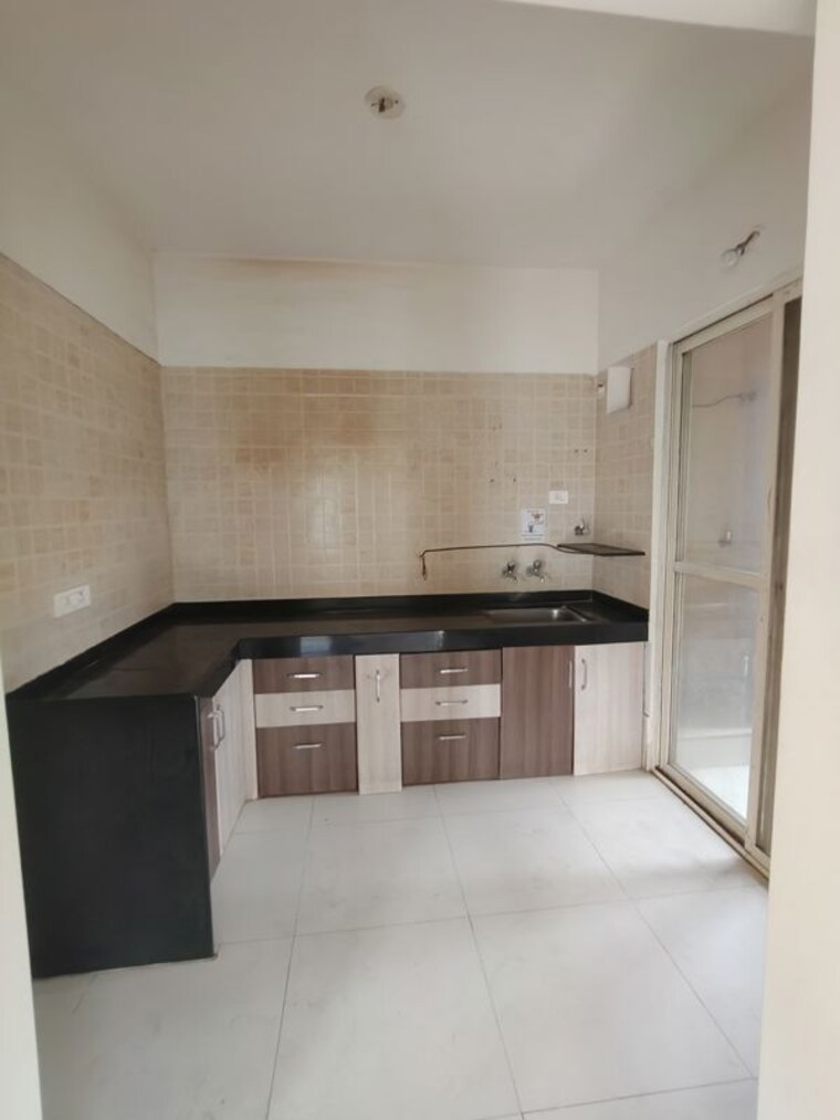 Kitchen, nyati-eternity-2-chs 2 Bedroom 1180 Sq.Ft. Apartment In Undri Pune 10509316