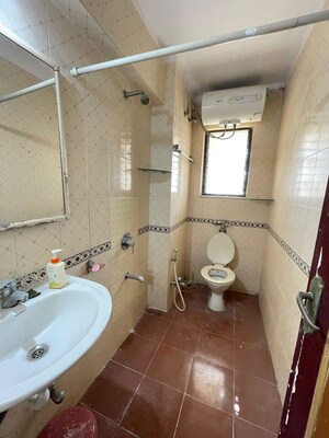 Bathroom in 2 BHK Apartment at Lokhandwala Whispering Palms XXclusives, Kandivali East – for Rent