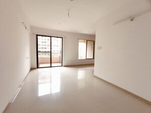 Living Room in 2 BHK Apartment at Kolte Patil Margosa Heights, Mohammadwadi – for Rent