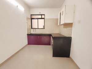 Kitchen in 2 BHK Apartment at Kolte Patil Margosa Heights, Mohammadwadi – for Rent