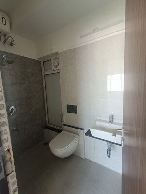 Bathroom in 1 BHK Apartment at Omkar Signet, Malad East – for Rent