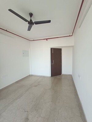 Living Room in 1 BHK Apartment at Omkar Signet, Malad East – for Rent