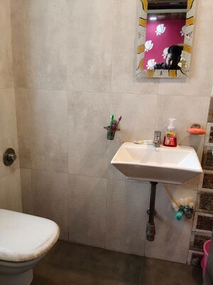Bathroom in 2 BHK Apartment at Vaibhav Paradise, Santacruz East – for Rent