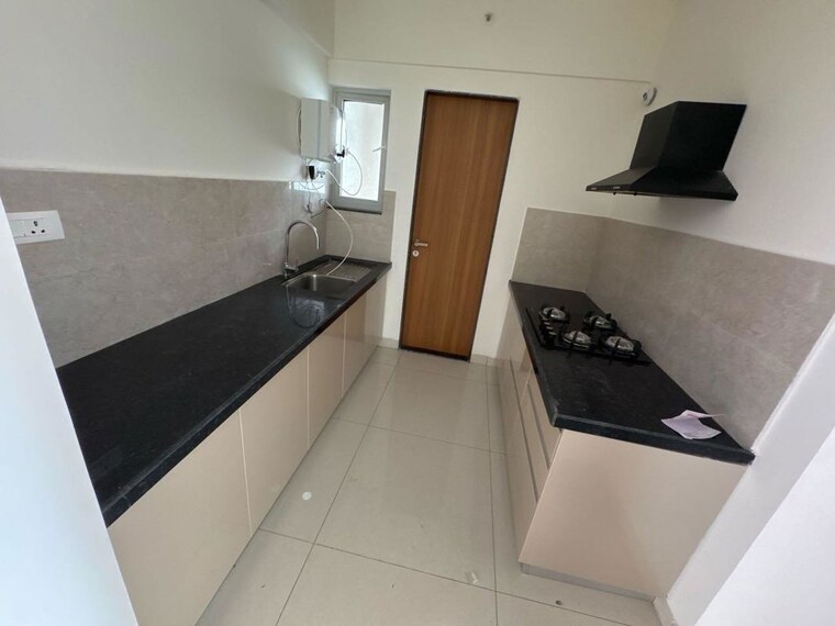 Kitchen, gera-planet-of-joy 2 Bedroom 1100 Sq.Ft. Apartment In Kharadi Pune 10509504