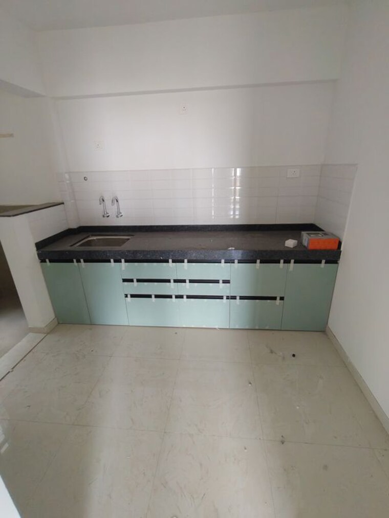 Kitchen, elated-khush-vista 2 Bedroom 1020 Sq.Ft. Apartment In Nibm Road Pune 10509576
