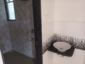 Bathroom in 3 BHK Apartment at Karma Rejoice, Undri – for Sale