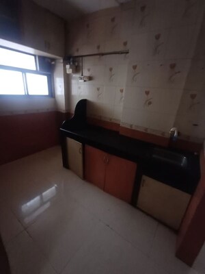 Kitchen in 2 BHK Apartment at Sai Baba Vihar Complex, Ghodbunder Road – for Rent